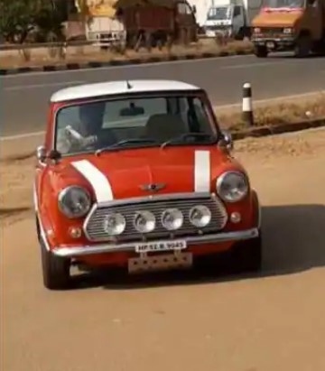sports-ms-dhoni-drives-red-color-mini-cooper-at-ranchi-watch-video